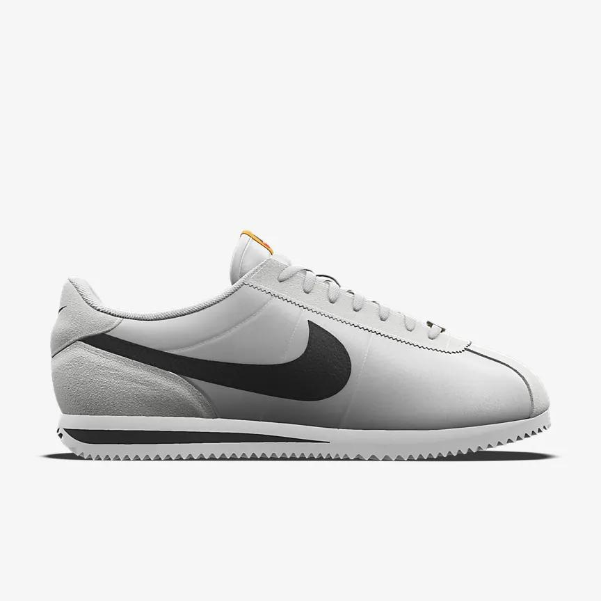 Giày Nike Cortez Unlocked By You Nữ Trắng Đen